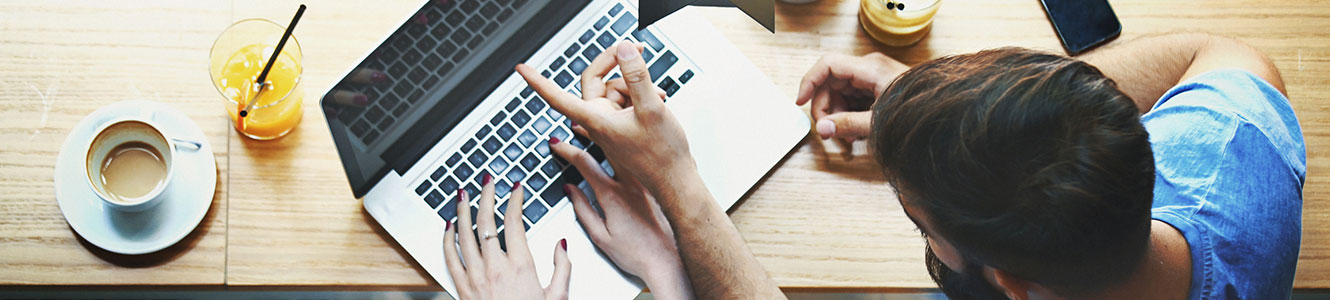 Couple looking at a laptop