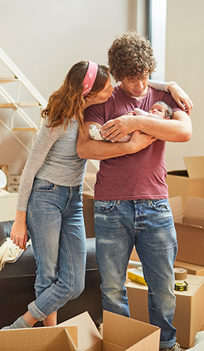 Family with baby in a new home